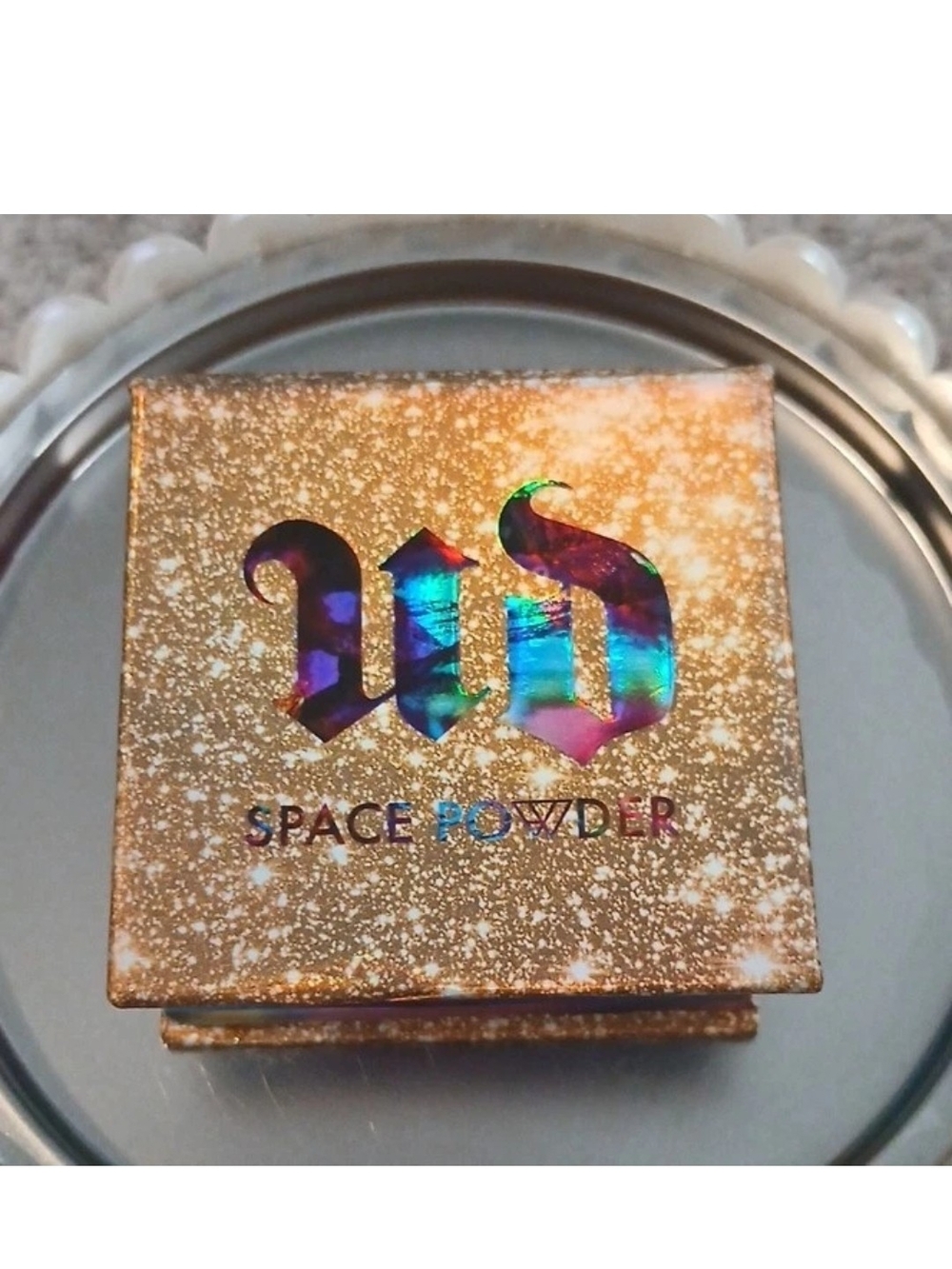 Urban Decay Space Powder Highlighter - Gold Holographic Logo